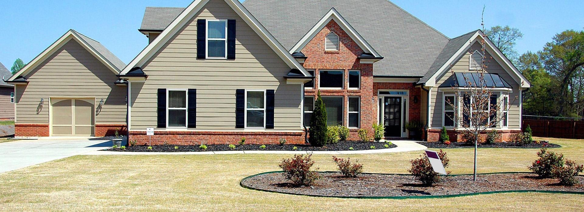Front house exterior (tan color)